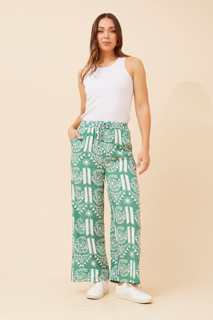 Elevate your casual wardrobe with SUZZEL abstract print pants in green
