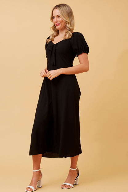 bow front black midi dress. Puff sleeves & timeless fit