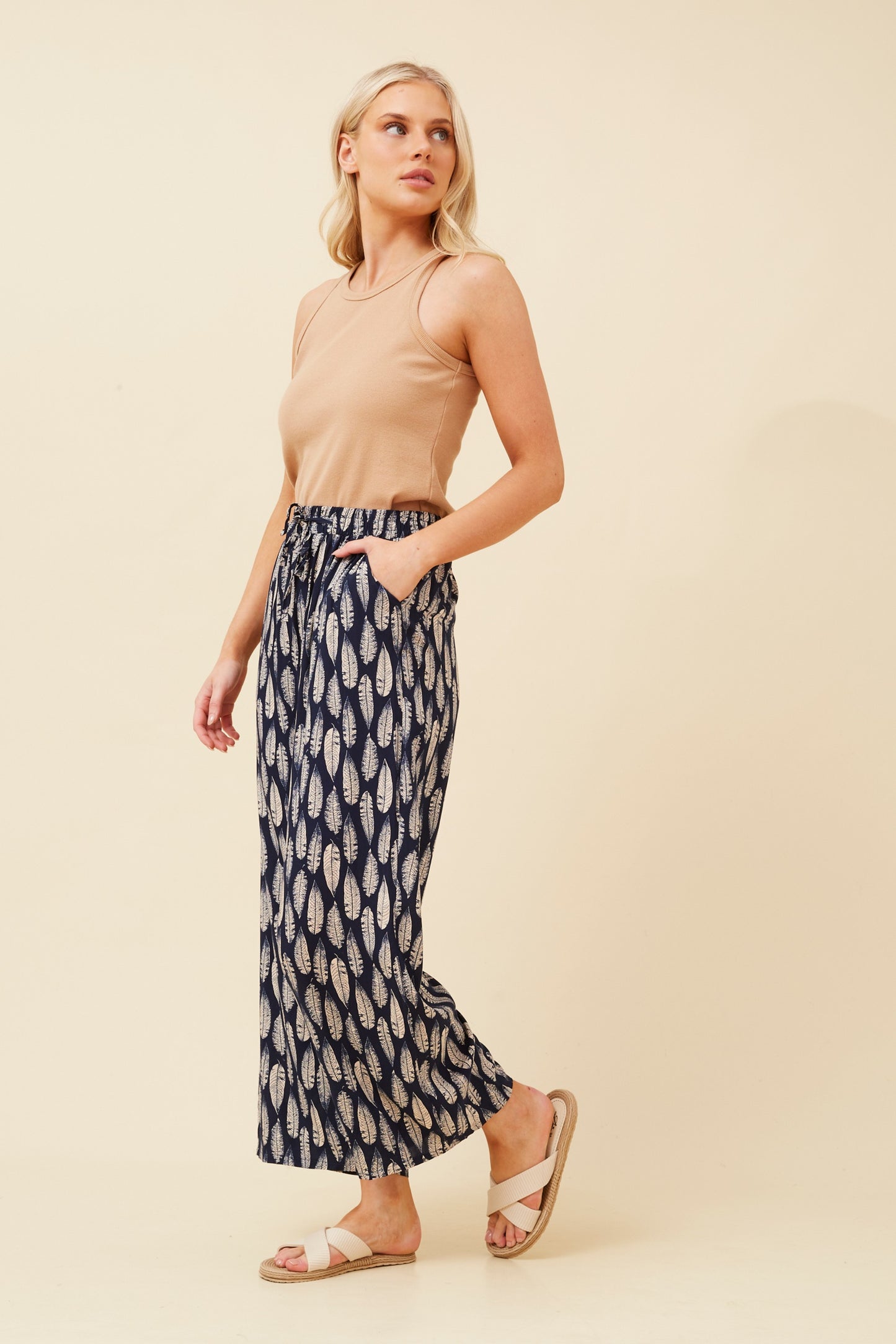 navy leaf print pants. Wide-leg silhouette