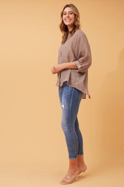 the Belina Solid Shirt. Relaxed fit, soft texture, and subtle back button detail combine comfort and style